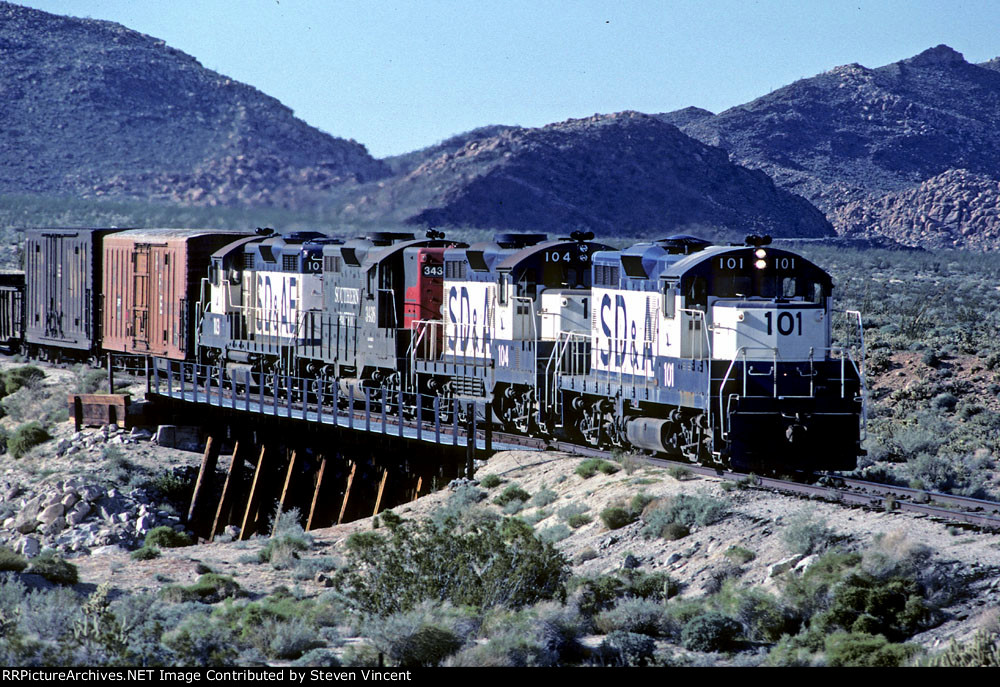 Kyle operated San Diego & Arizona Eastern eastbound freight led by SDAE #101 approaches Dos Cabezas.